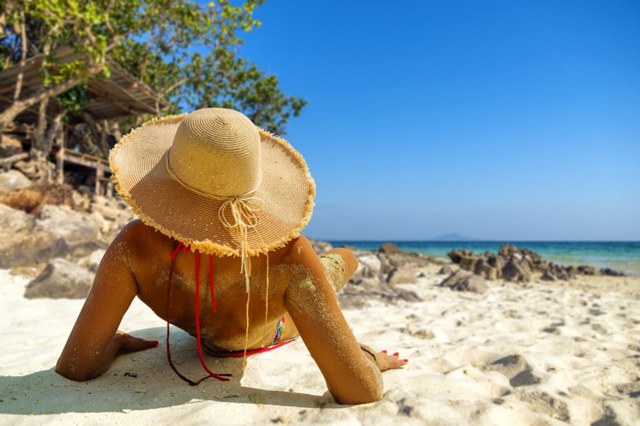 Woman Resting At The Tropical Beach Resort